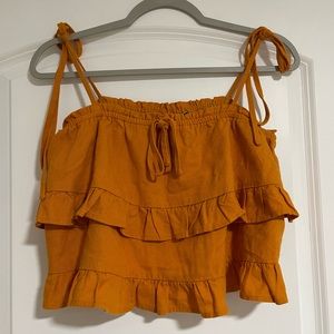 Orange ruffled crop top